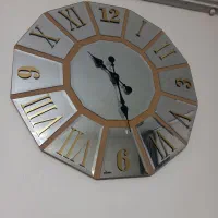 ساعت دیواری آینه