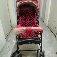 کالسکه کودک طرح کفش دوزکی