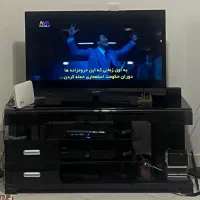 میز تلویزبون شیشه ای