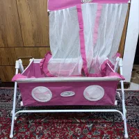 گهواره همراه با تور محافظ
