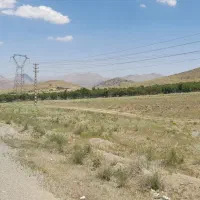 زمین ۲۶۵۰۰متری کنار جاده اصلی