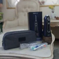 مسواک واترجت جرمگیر دندان آکبند