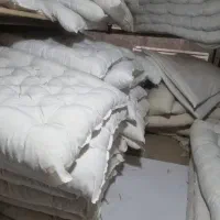 کارگر حلاجی دوخت تشک بالش