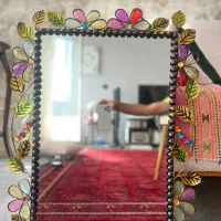 آینه با قاب فرفورژه