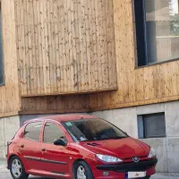 پژو ۲۰۶ تیپ دو قرمز بی رنگ و خط و خش