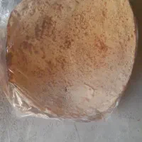 نان خانگی با آرد بومی و کنجد زیاد