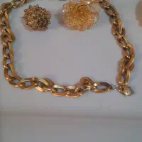 طل۱۸ عیار فقط ۱۰۰‌ .    بالای تابلو