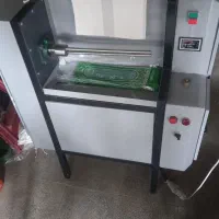 دستگاه رول کن سفره یکبار مصرف وکیسه زباله و فریزر