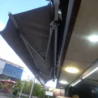 سایه بان مغازه، کافه