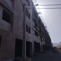 کارگر دوغاب ریز،نمای سنگ ساختمان