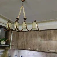 پرده با والان،کاناپه تخت شو،لوستر اشپزخانه