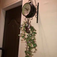 ساعت دیواری دو طرفه