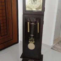 میز تلویزیون وساعت وسینمای خانگی