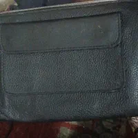 کیف دستی چرم و یک عدد رو دوشی