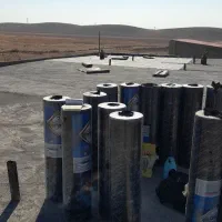 ایزوگام شرق کار لکه گیری  آسفالت محوطه قیرگونی