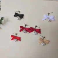 گوشواره پاپیونی با آویز مرواریدی