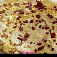 آشپز برای صبحانه خوری و نون توموشی