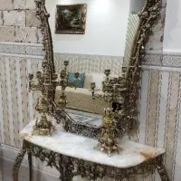 آینه کنسول و یک جفت شمعدان برنز