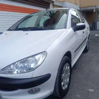 پژو ۲۰۶ SD V8 سفید مدل ۹۹ مشابه خشک واقعی