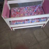 تخت خواب گهواره‌ای صورتی کودک سالم|تخت و صندلی بچه|ساوه, |دیوار