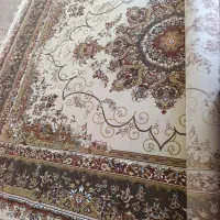 یک عدد فرش دوازده متری داخل پلاستیک