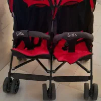 کالسکه دوقلویی کنارهم