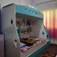 تخت دو طبقه،و کمد
