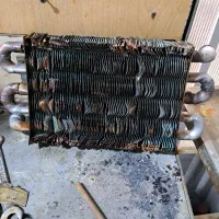 جوشکاری وبازسازی مبدل ابگرمکن وپکیج