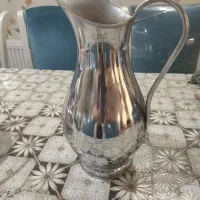 پارچ کنار سماور و کتری