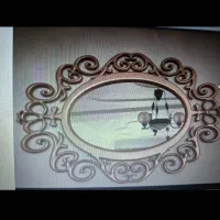 آینه قاب چوبی طلایی