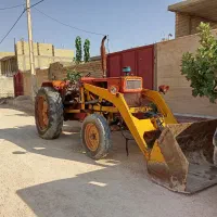 فروش تراکتور رومانی بیل جلو .ویک عدد کود پاش دامی