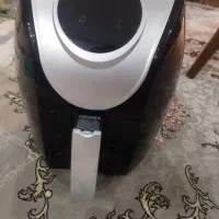 سرخکن بدون روغن. اجاق گاز.آبمیوه گیری