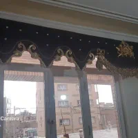 کتیبه رنگ قهوه‌ای  وطلایی  حدود ۵ متر