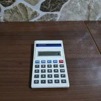 ماشین حساب قدیمی SHARP