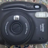 دوربین دیجیتال  فوری و یک عدد اپل واچ