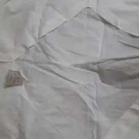 دوتا ملافه دوخته شده خارجی و پارچه