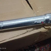 ماشین اصلاح قدیمی وچراغ قوه قدیمی