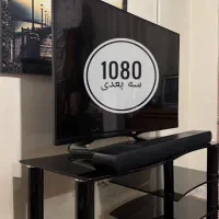 تلویزیون سه بعدی ال جی 1080و ساندبار ومیزتلویزیون