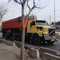 کشنده ولوو N12  طلا با لگن کمپرسی عثمان .بیمه بدنه