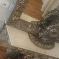 اینه و شمعدان برنزی