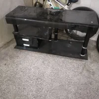 میز تلویزیون شیشه‌ای شیک و سالم