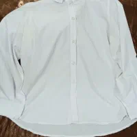 تعدادی لباس|لباس|بندر انزلی, نوغان|دیوار