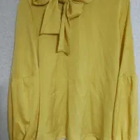 تعدادی شومیز مجلسی و بافت زنانه نو|لباس|شیراز, قلعه شاهزاده بیگم|دیوار