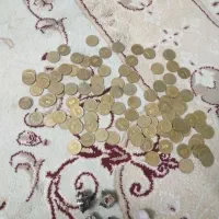 سکه ۱۰ریالی وسنگ ابسیدین