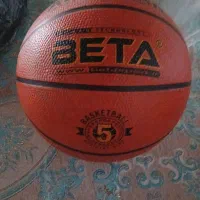 توپ بسکتبال وحلقه ورزشی