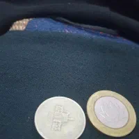 سکه0 25و2000ریال