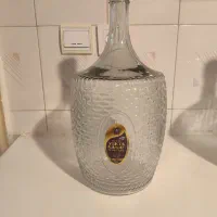 ظرف شیشه‌ای مخصوص نگهداری آبغوره آبلیمو سرکه