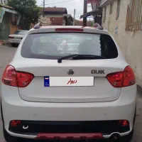 ماشین کوییک‌R‌سفید‌و‌قرمز