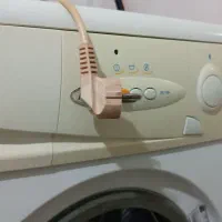 ماشین لباسشویی خشک کن|ماشین لباسشویی و خشک‌کن لباس|هشتگرد, گلسار|دیوار