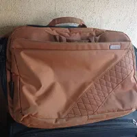 یک عدد کیف اداری خارجی یک عدد چمدان مسافرتی